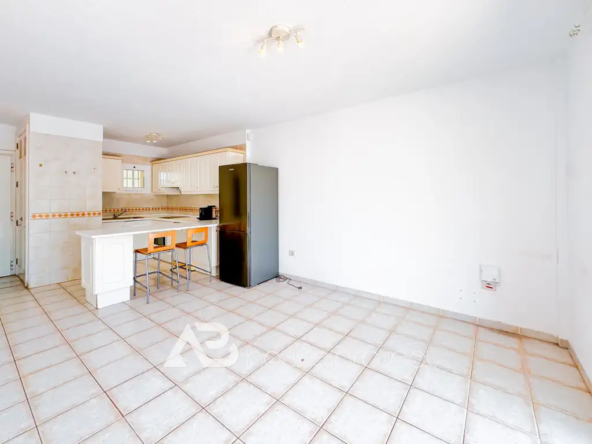 salón del piso en vente en el complejo La Finca en Chayofa